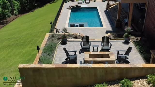 A completed DSLD pool, patio and outdoor living project viewed from above